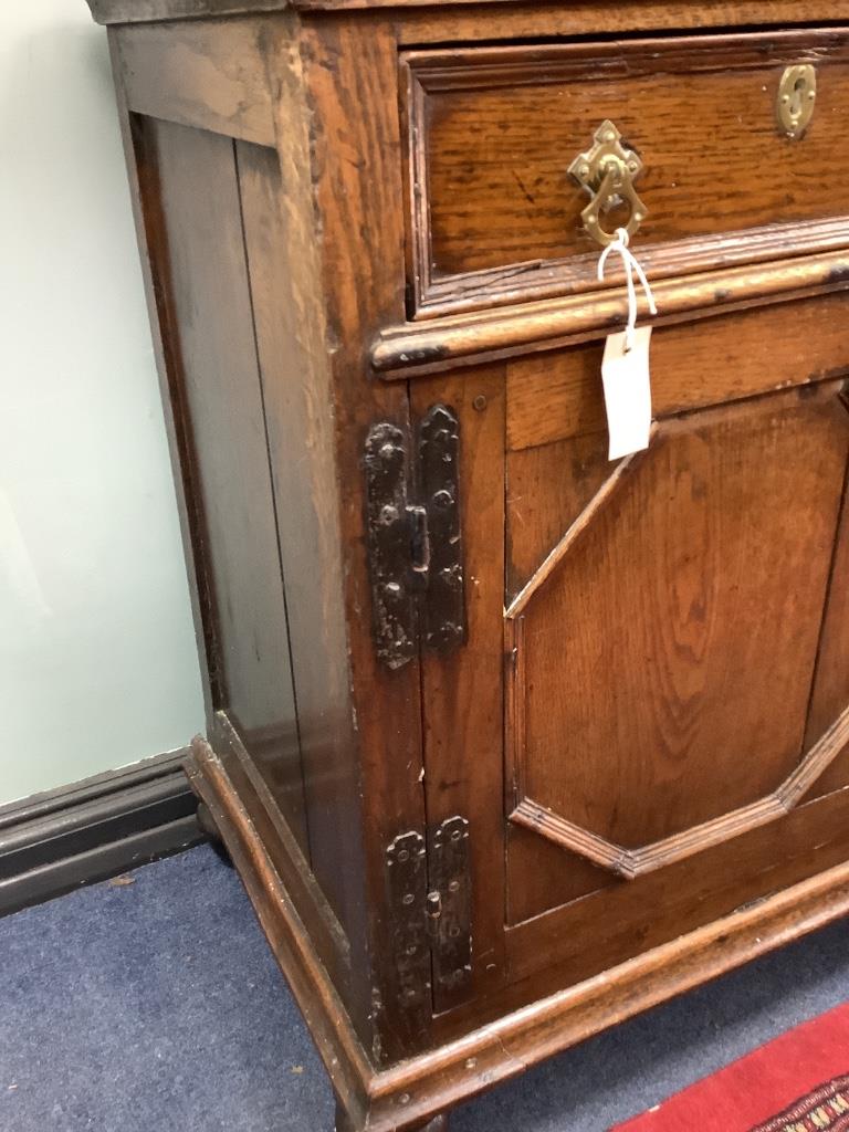 An 18th century oak low dresser, width 182cm depth 47cm height 89cm